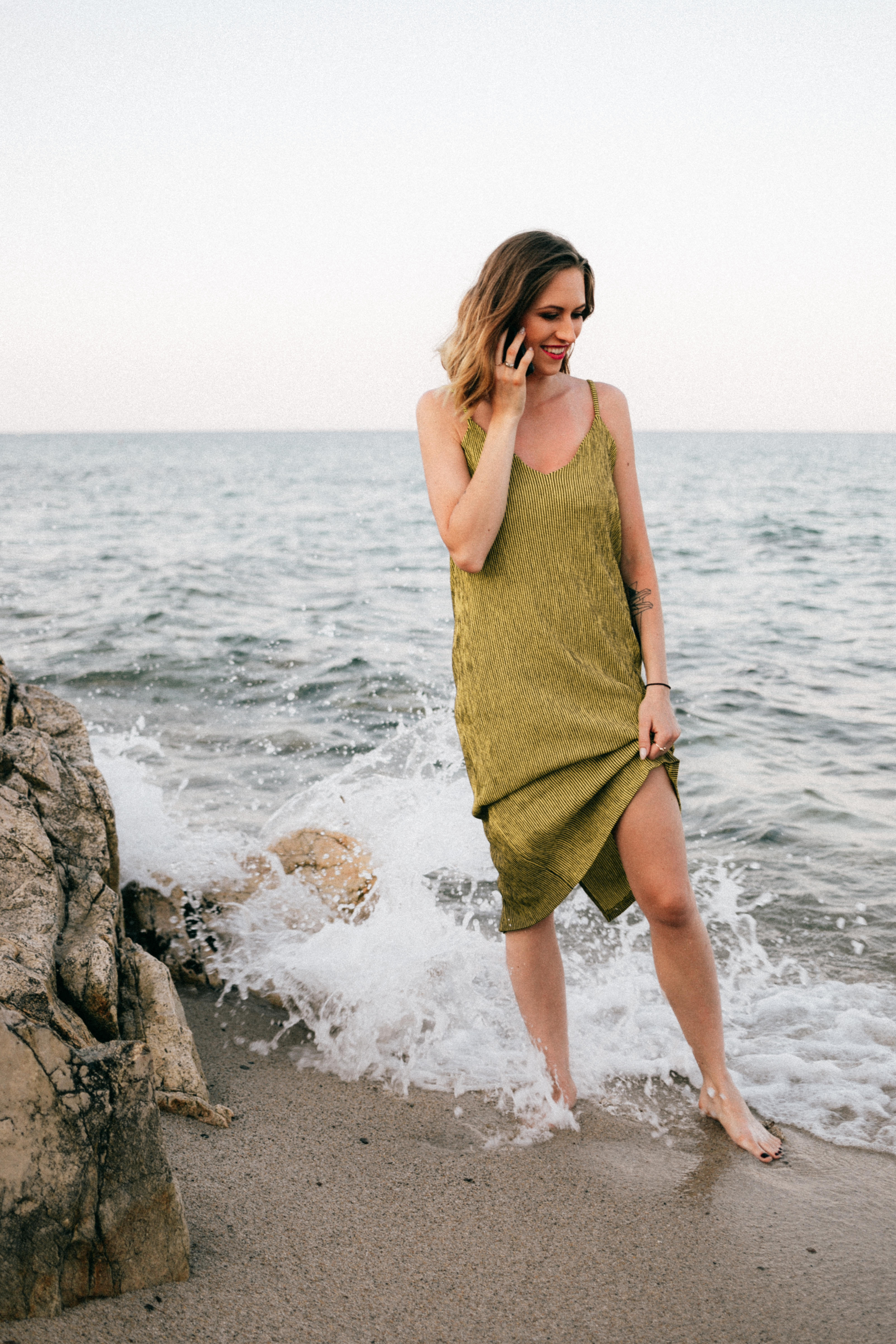 Client on a beach during a photography session
